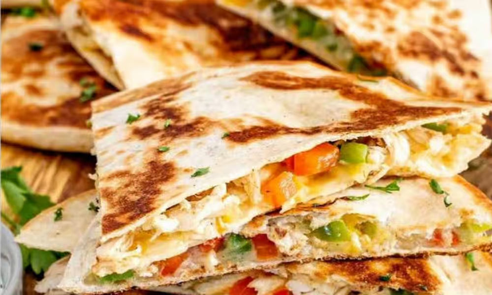 Chicken quesadilla with fries from Nour's Cuisine
