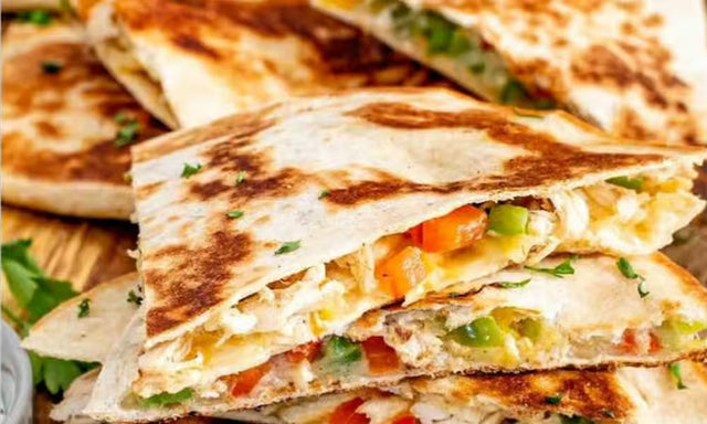Chicken quesadilla with fries from Nour's Cuisine