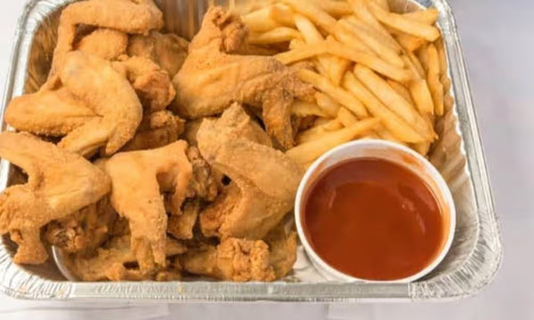 10-piece crispy wings with fries from Nour's Cuisine